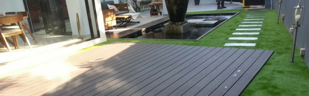 Artificial grass and decking design